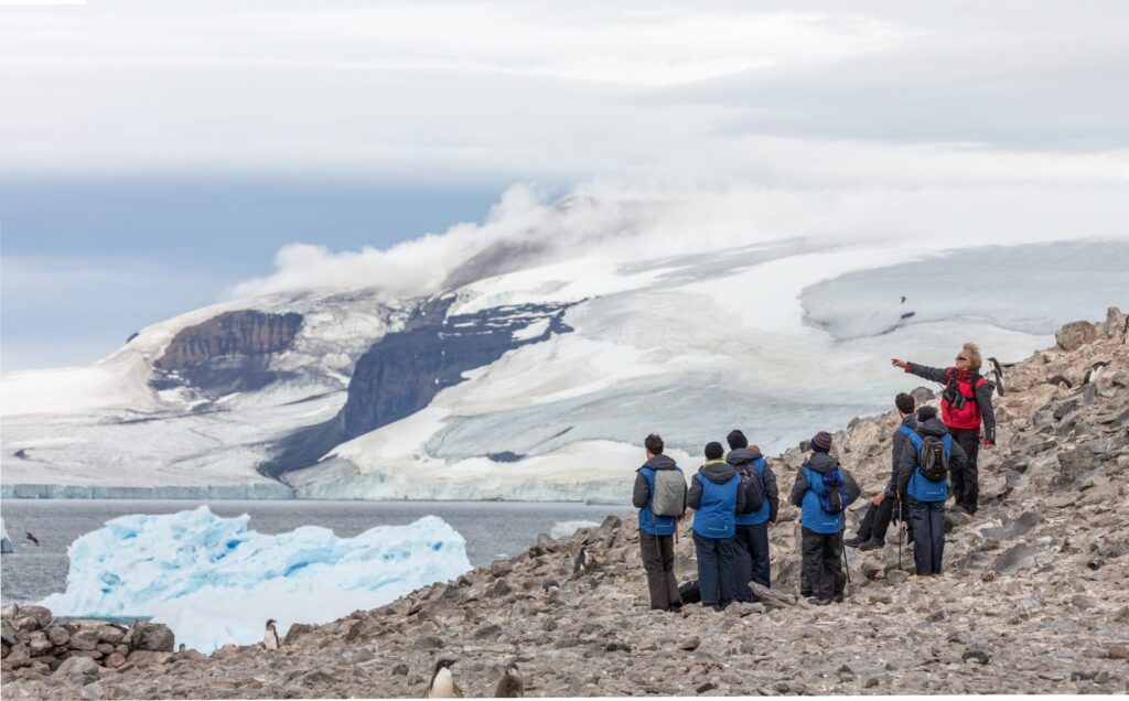 Expeditioners enjoying a shore excusion, Antarctica, Michael Baynes