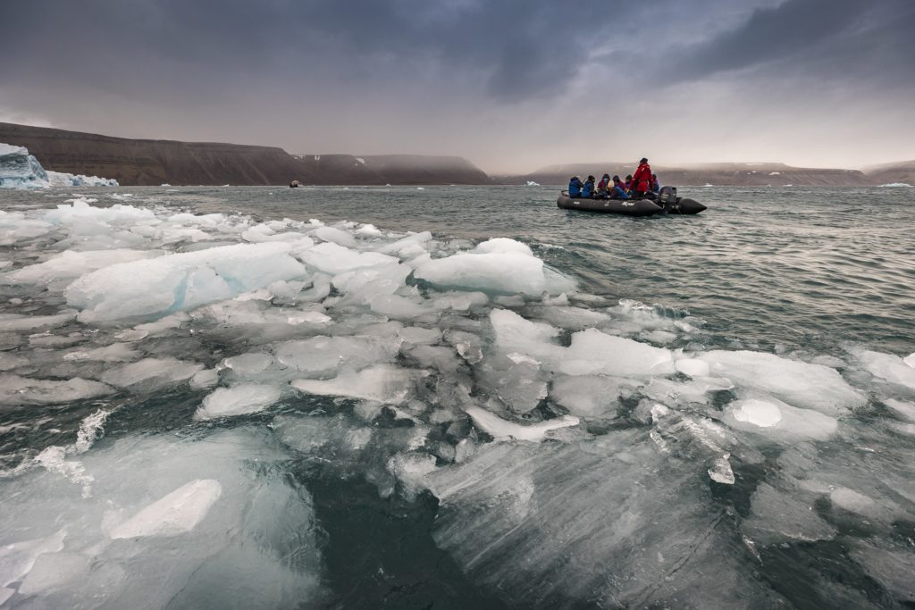 Zodiac cruising to observe sea ice at Croker Bay in Canada's Northwest Passage